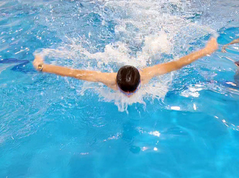 The butterfly stroke is renowned for its graceful yet dynamic movement ...